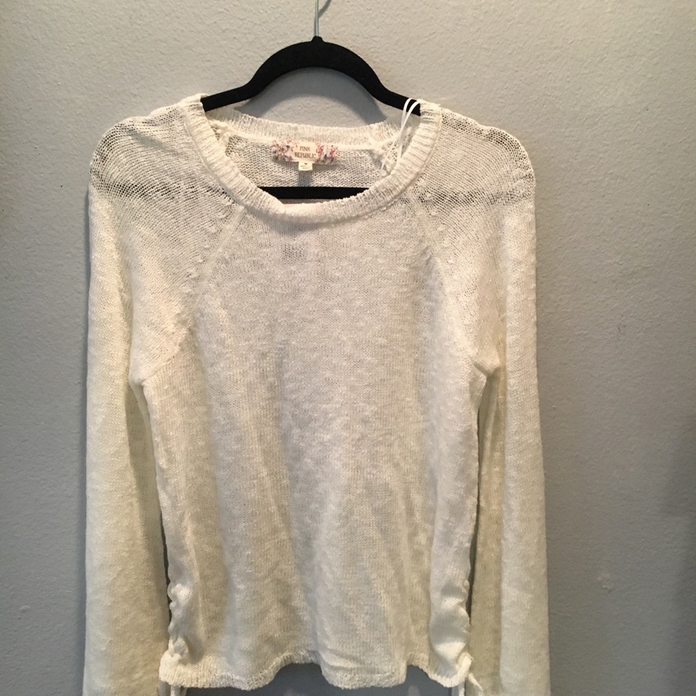 Lightweight sweater laced up on the side